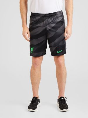 Teplákové nohavice Nike zelená