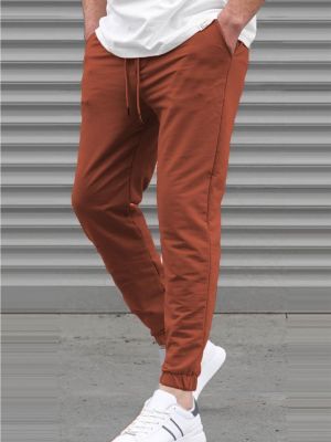 Teplákové nohavice Madmext oranžová