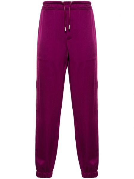 Saténové teplákové nohavice Saint Laurent ružová