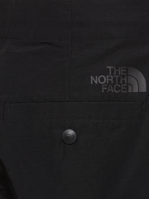 Relaxed fit kelnės The North Face juoda