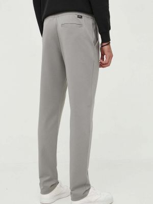 Sportovní kalhoty Guess šedé