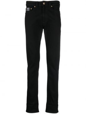 Bombažne skinny fit kavbojke Versace Jeans Couture črna