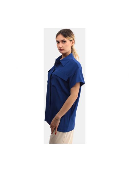 Camisa con botones de seda Liviana Conti azul