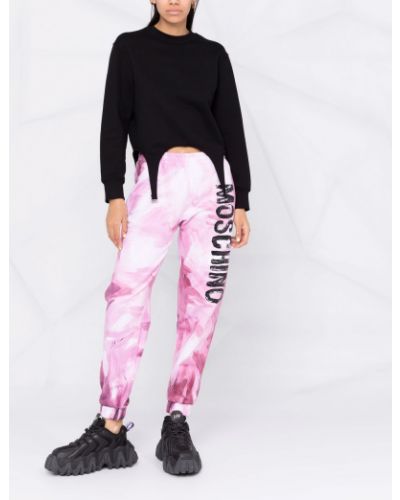 Spodnie sportowe z nadrukiem w abstrakcyjne wzory Moschino różowe