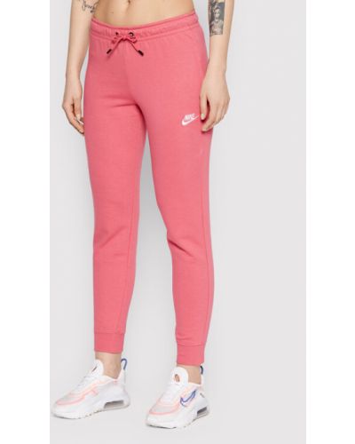 Slim fit sportovní kalhoty Nike růžové