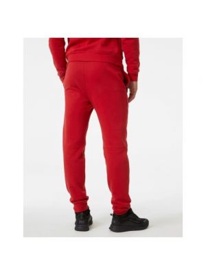 Pantalones de chándal Helly Hansen rojo