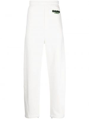 Bavlnené teplákové nohavice Oamc biela