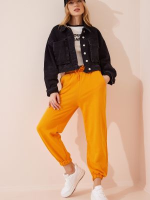 Teplákové nohavice Happiness İstanbul oranžová