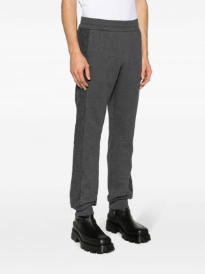 Sportovní kalhoty Versace šedé