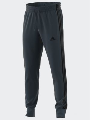 Pruhované sportovní kalhoty Adidas