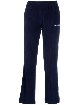 Bavlnené jogger nohavice s výšivkou Sporty & Rich modrá