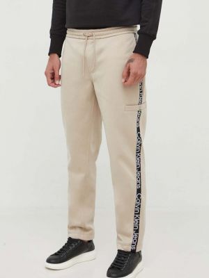 Панталон с апликация Calvin Klein Jeans бежово