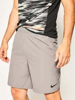 Priliehavé športové šortky Nike sivá