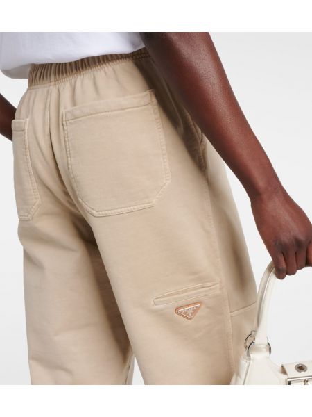 Bavlněné sportovní kalhoty s vysokým pasem Prada béžové