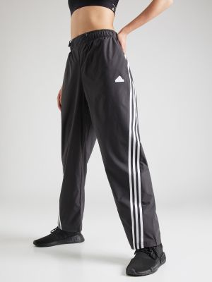 Pruhované teplákové nohavice Adidas Sportswear