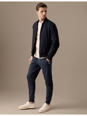 Sportovní kalhoty na zip Marks & Spencer modré