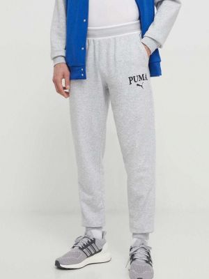 Спортивні штани з принтом Puma сірі