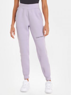 Sportovní kalhoty relaxed fit Calvin Klein Performance fialové