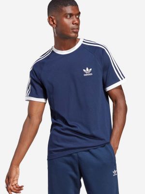 Koszulka bawełniana w paski Adidas Originals niebieska