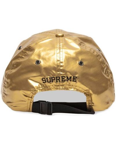 Gorra Supreme dorado