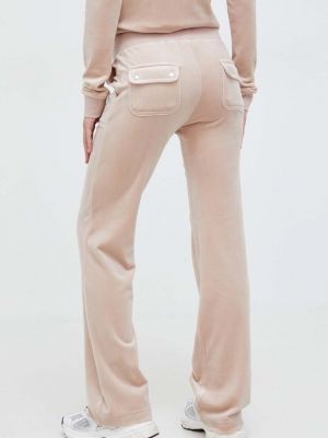 Velurové sportovní kalhoty Juicy Couture béžové