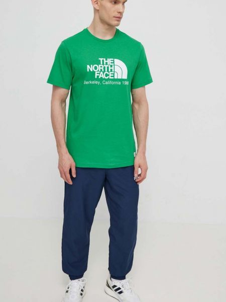 Koszulka bawełniana z nadrukiem The North Face zielona