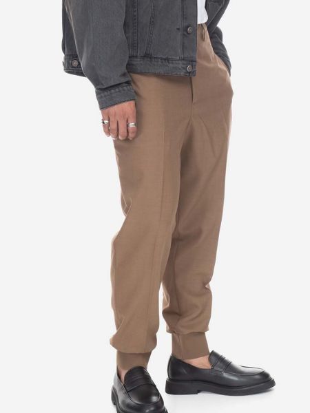 Jednobarevné slim fit kalhoty s nízkým pasem Neil Barrett hnědé