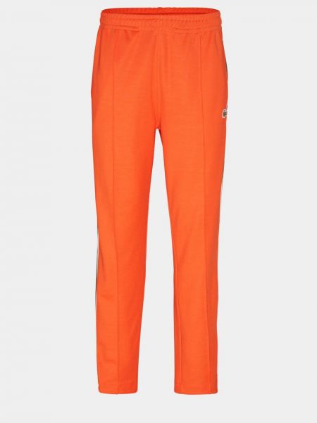 Spodnie sportowe Lacoste pomarańczowe