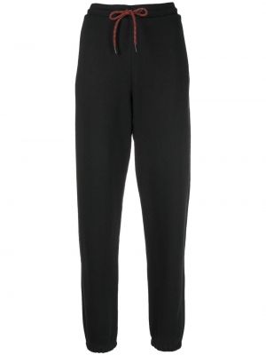 Памучни спортни панталони Reebok X Victoria Beckham черно