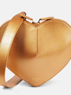 Kožená kabelka Alaã¯a zlatá