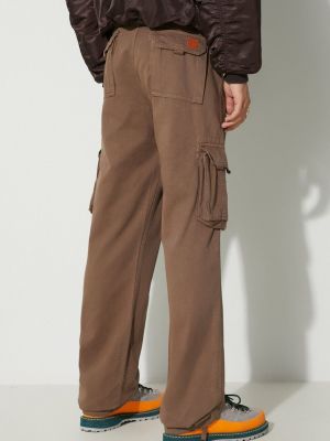 Jednobarevné bavlněné kalhoty Alpha Industries béžové