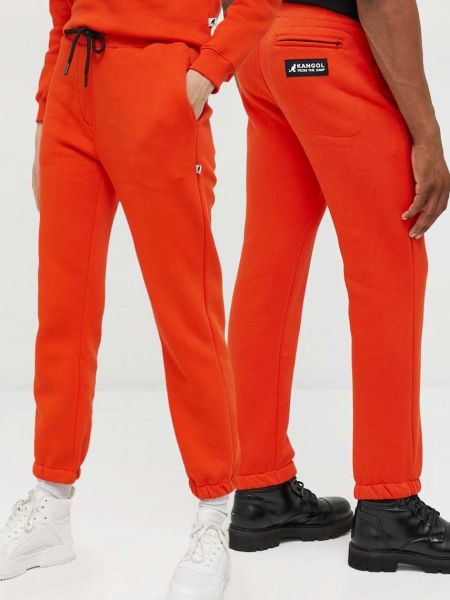 Pomarańczowe spodnie sportowe Kangol