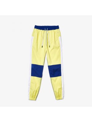 Spodnie sportowe Lacoste żółte