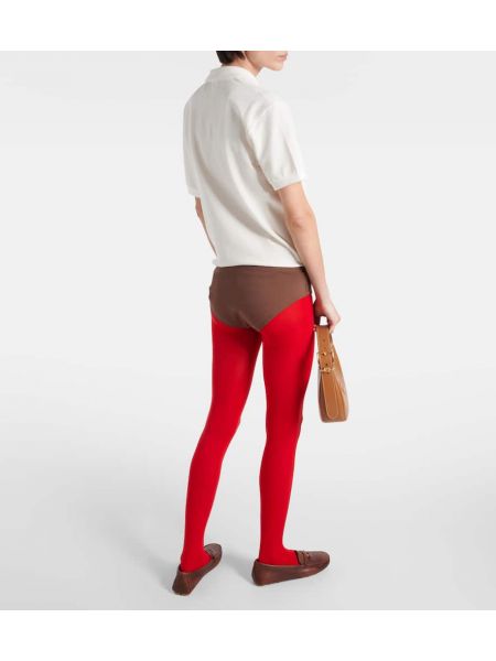 Žametne hlačne nogavice iz rebrastega žameta Wolford rdeča