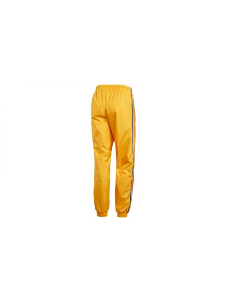 Повседневные спортивные штаны Adidas желтые