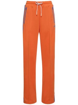 Nohavice Adidas Originals oranžová