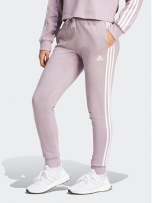 Pruhované slim fit sportovní kalhoty Adidas růžové