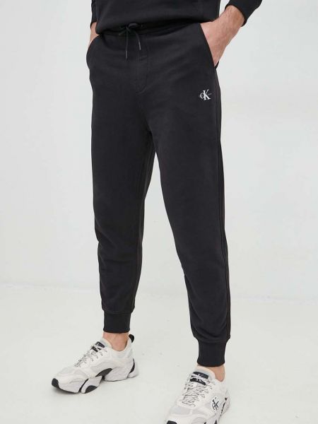 Calvin Klein Jeans pamut melegítőnadrág fekete, férfi, sima