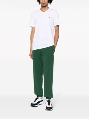 Bavlněné sportovní kalhoty Lacoste zelené