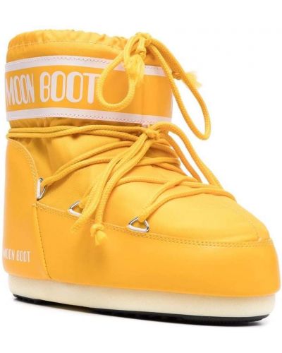 Botas con cordones Moon Boot amarillo