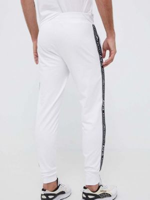 Bavlněné sportovní kalhoty s potiskem Ea7 Emporio Armani bílé