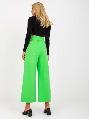 Sportovní kalhoty s dírami Fashionhunters zelené