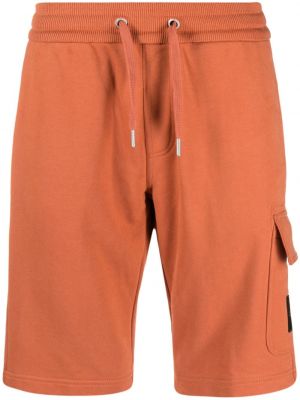 Βαμβακερό παντελόνι Calvin Klein Jeans πορτοκαλί