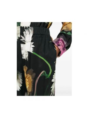Pantalones de flores con estampado Stine Goya negro