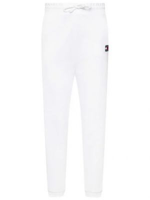 Sportovní kalhoty relaxed fit Tommy Jeans bílé