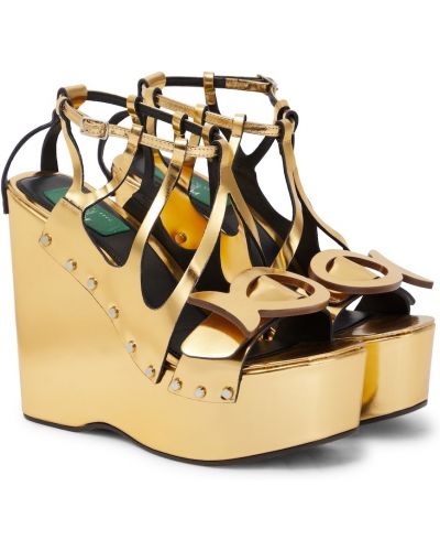 Kožené sandály na klínovém podpatku Pucci zlaté