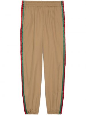 Спортни панталони на райета Gucci кафяво