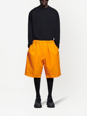 Pantalones chinos oversized plisados Balenciaga naranja