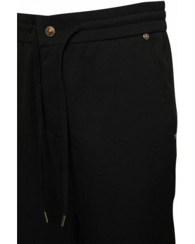 Viskózové nohavice Versace Jeans Couture čierna