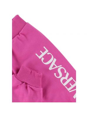 Spodnie sportowe Versace różowe
